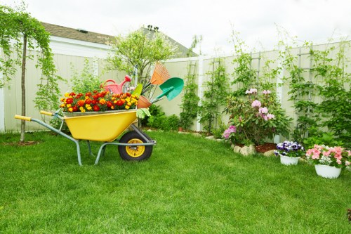 Seasonal lawn mowing in Grahame Park with adjusted cutting height